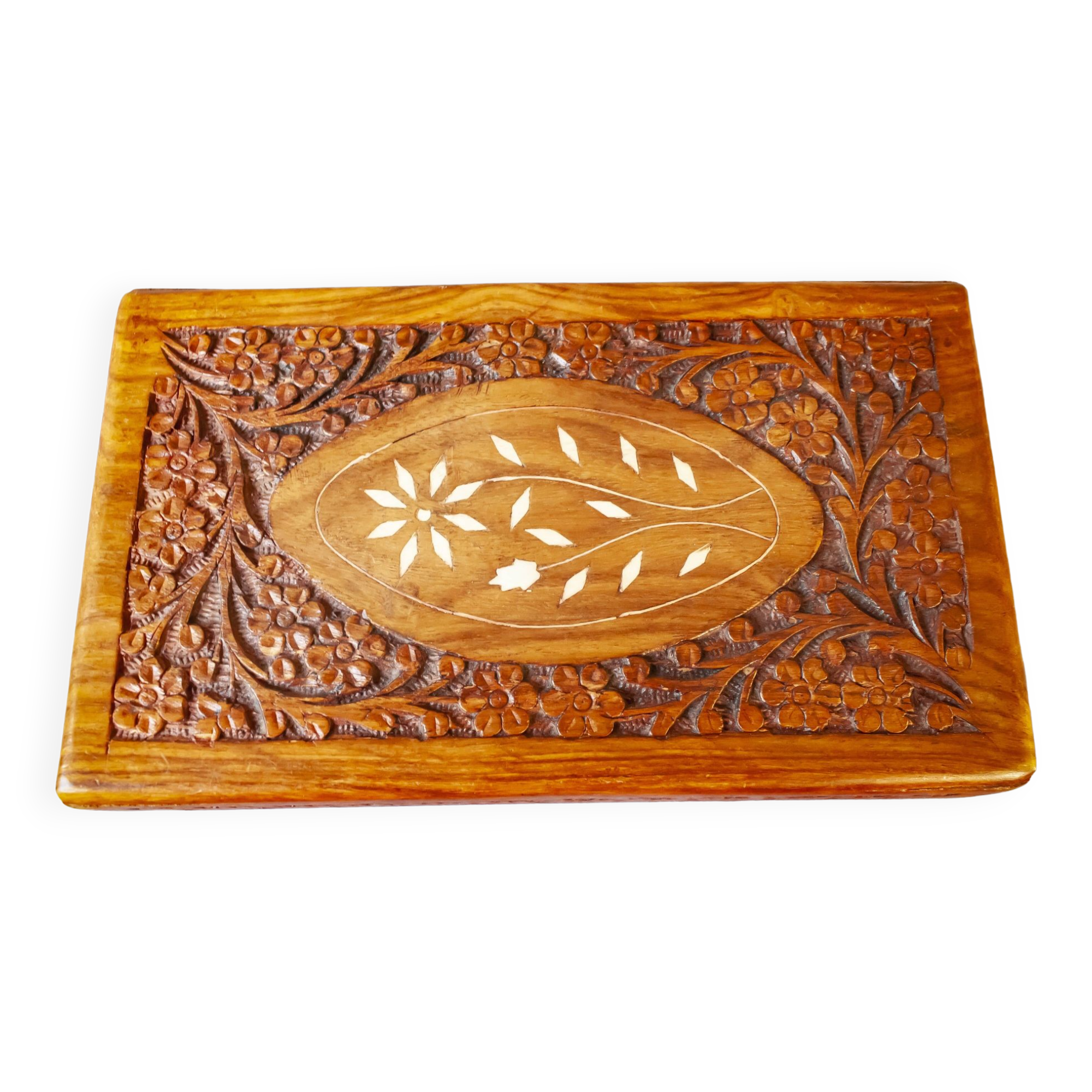 Antique hand-carved wooden boxes.