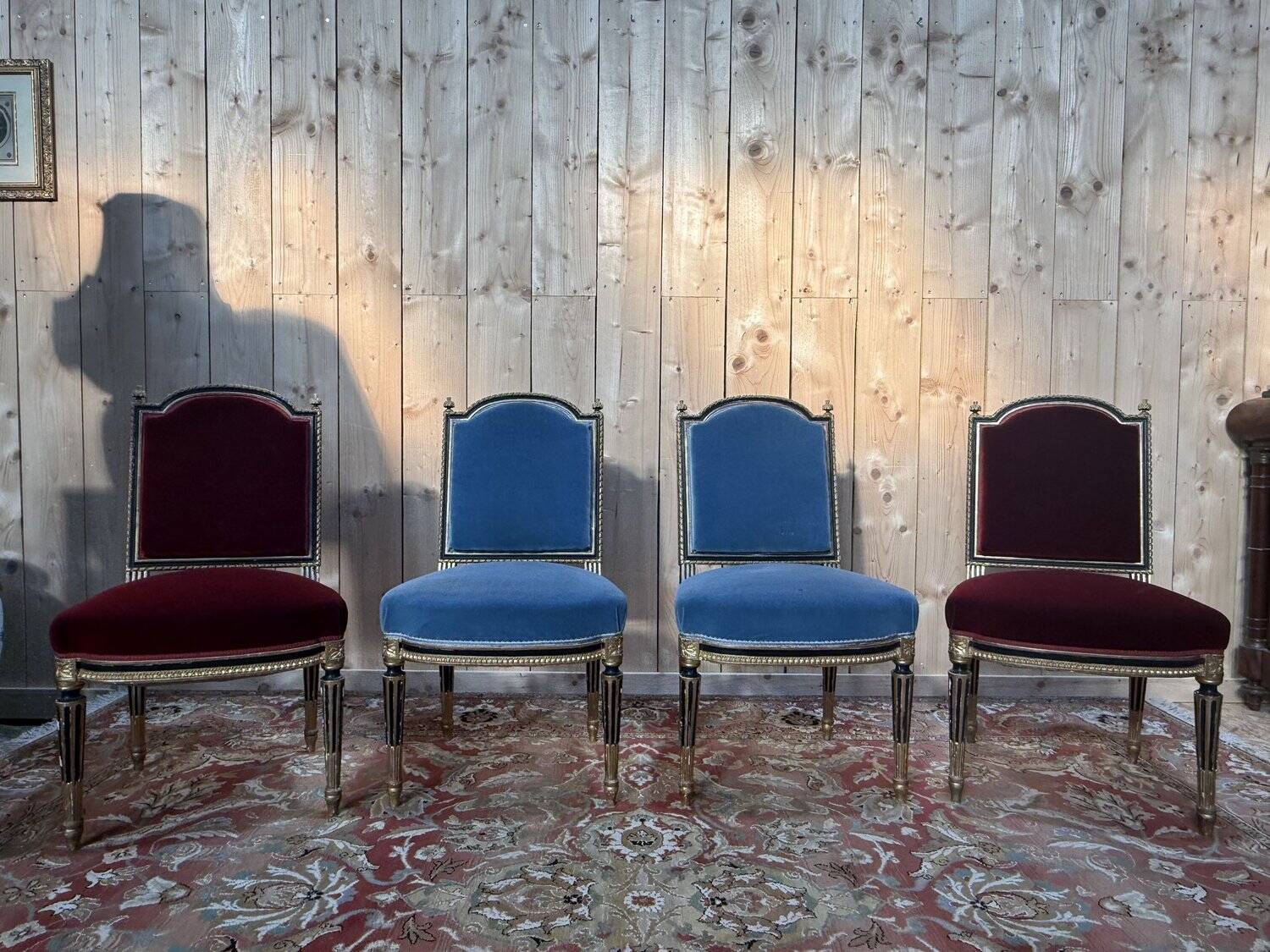 Set of 4 Napoleon III chairs in black and gold.