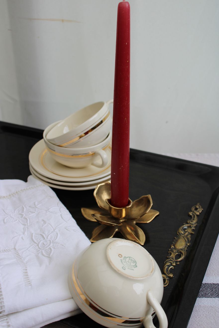 Golden brass candle holder