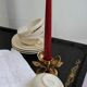 Golden brass candle holder