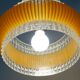 Transparent plastic space age lustre with orange band from the 70s.