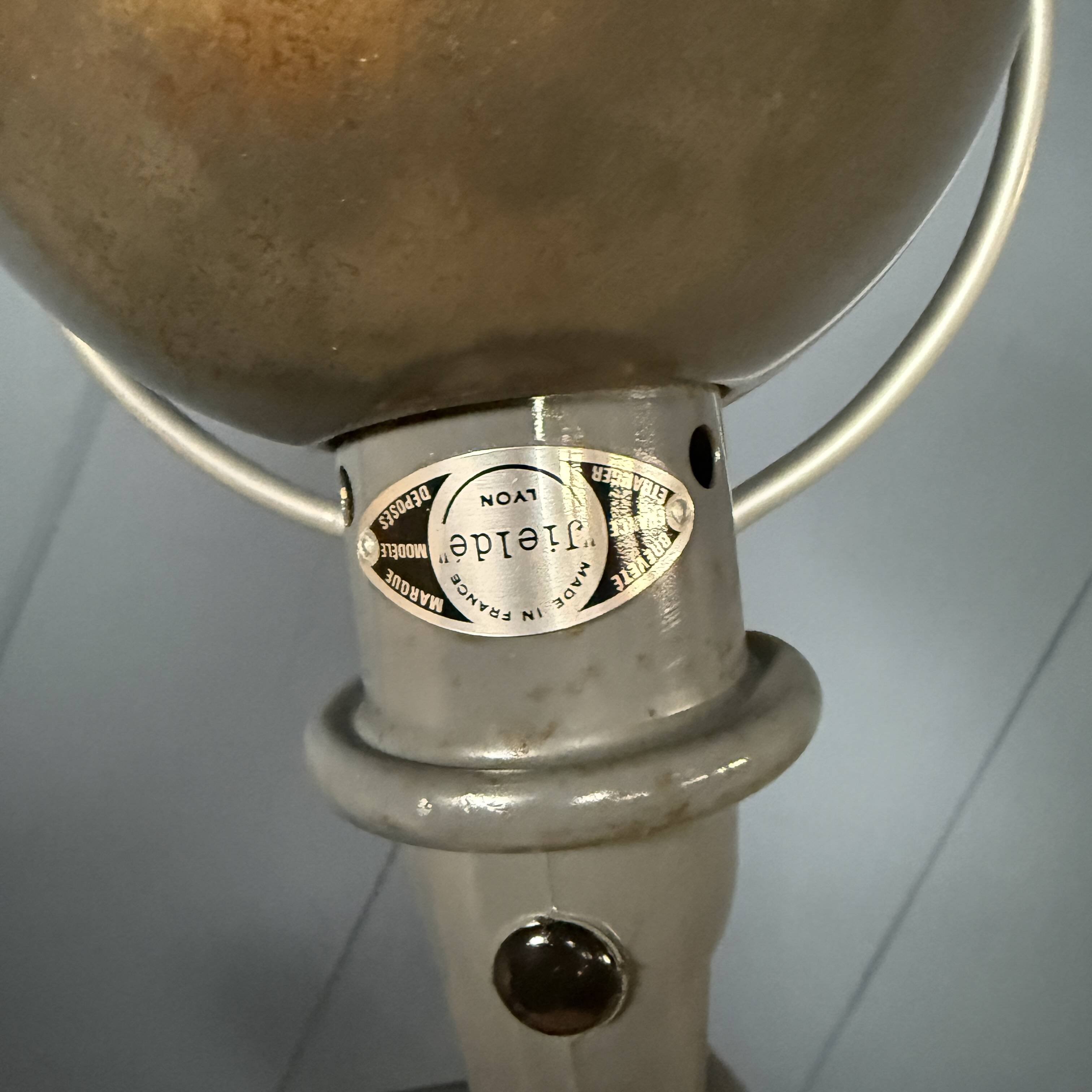 Dark grey Jielde three-arm clamp table lamp