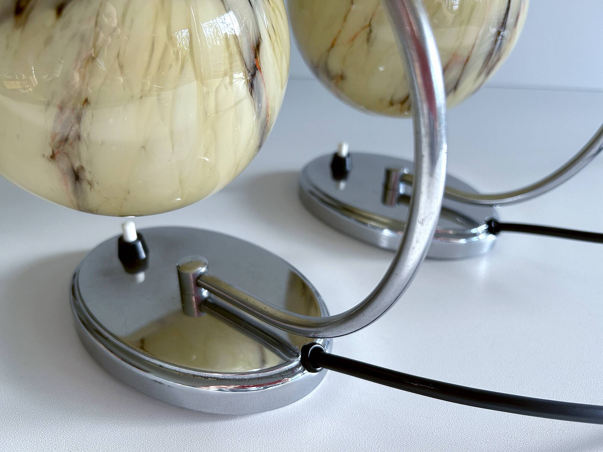 Pair of art deco lamps, chrome glass