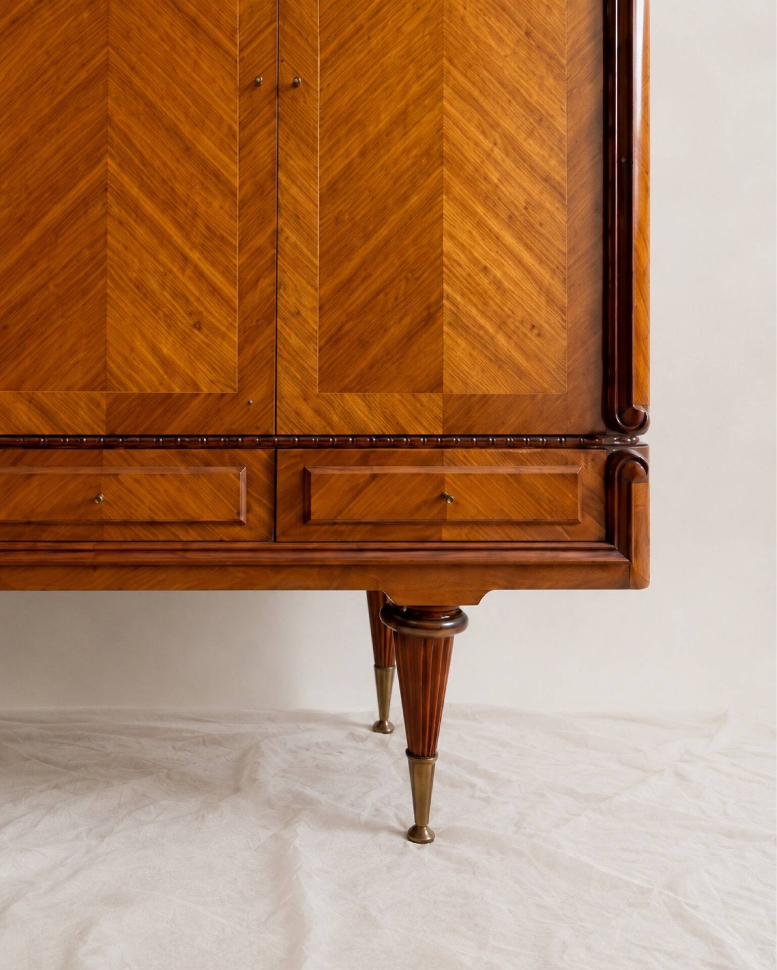 Vintage 4-door chevron wood wardrobe with mirror and gold legs.