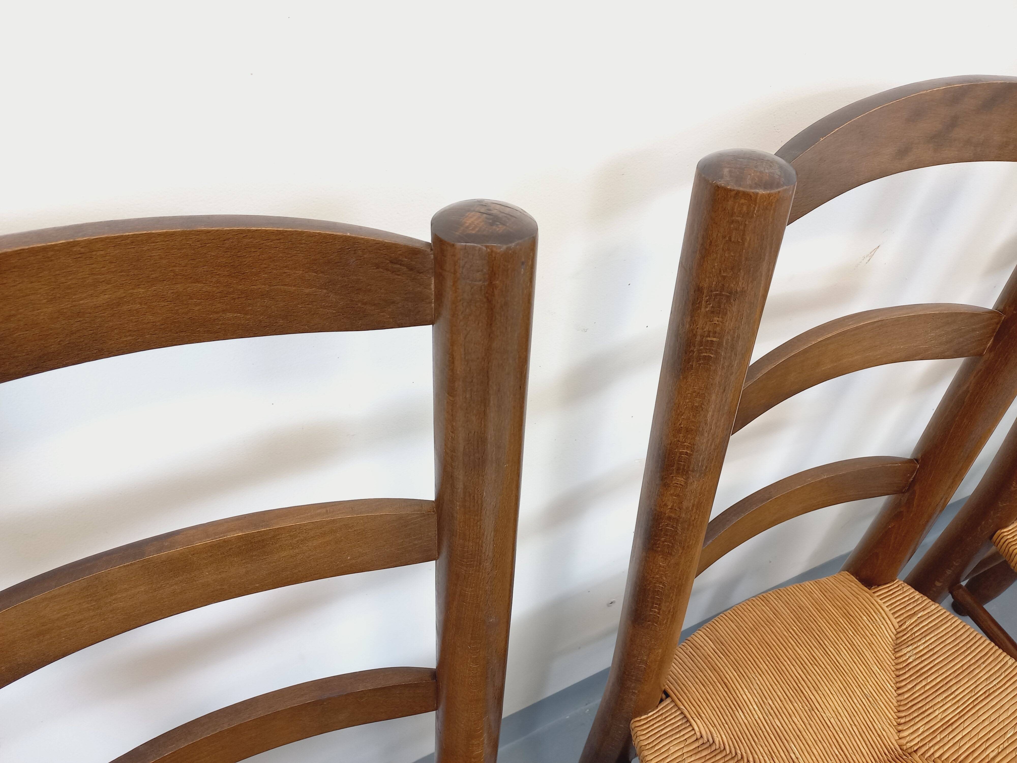 Set of 4 vintage brutalist chairs in wood and straw from the 1960s.