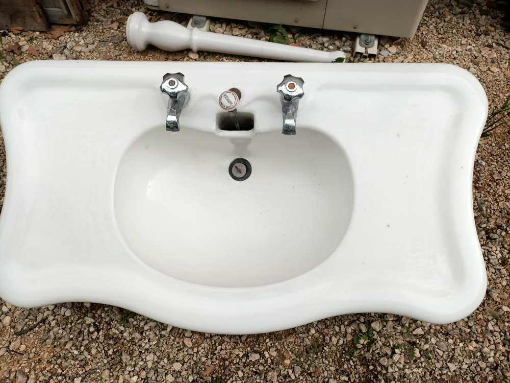 Old pedestal washbasin