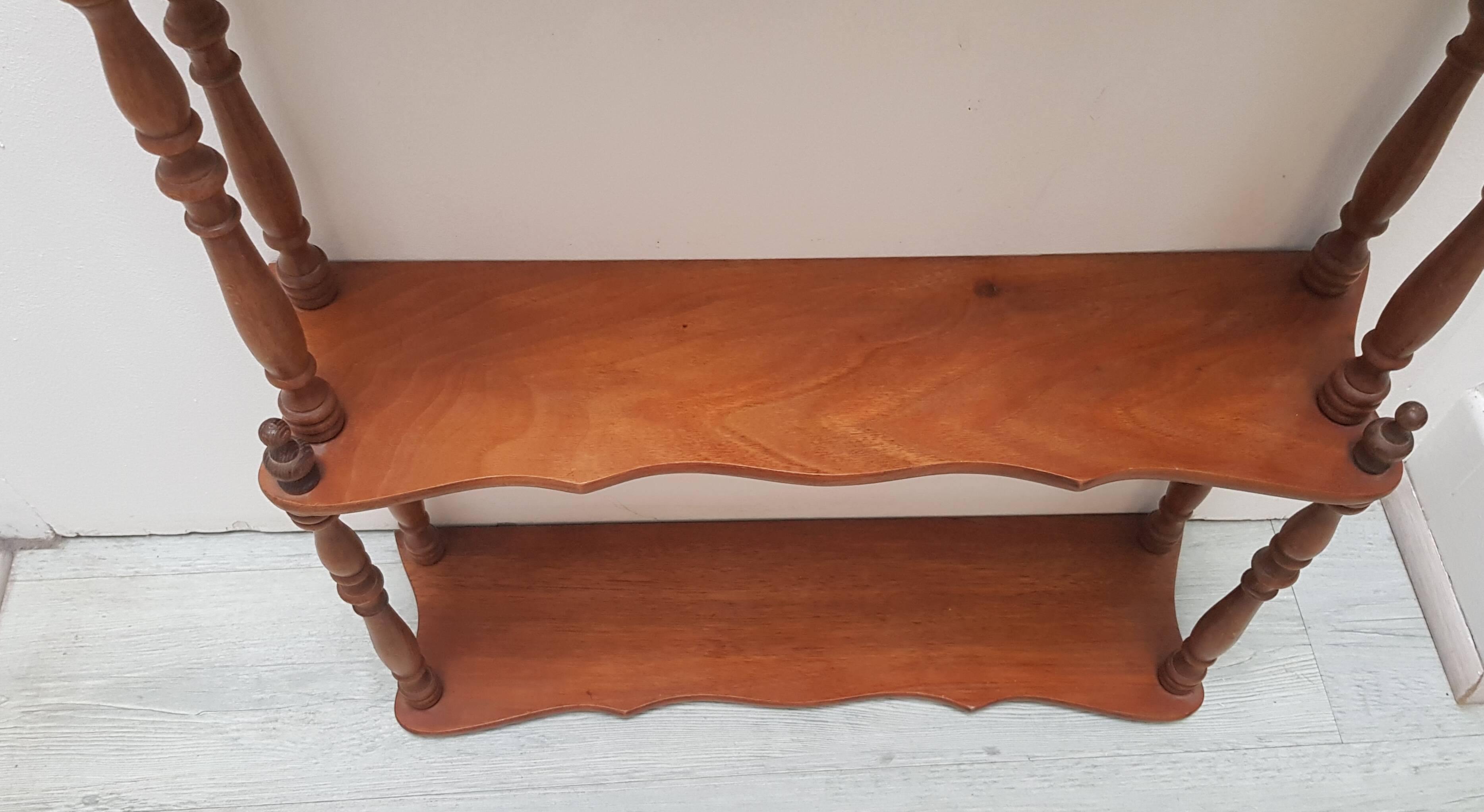 Turned wooden shelf
