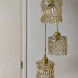 Triple antique globe pendant light in amber glass