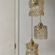 Triple antique globe pendant light in amber glass