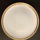 8 flat porcelain plates from Limoges Bernardaud, gilded Greek decoration, twentieth century