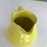 Old yellow carafe