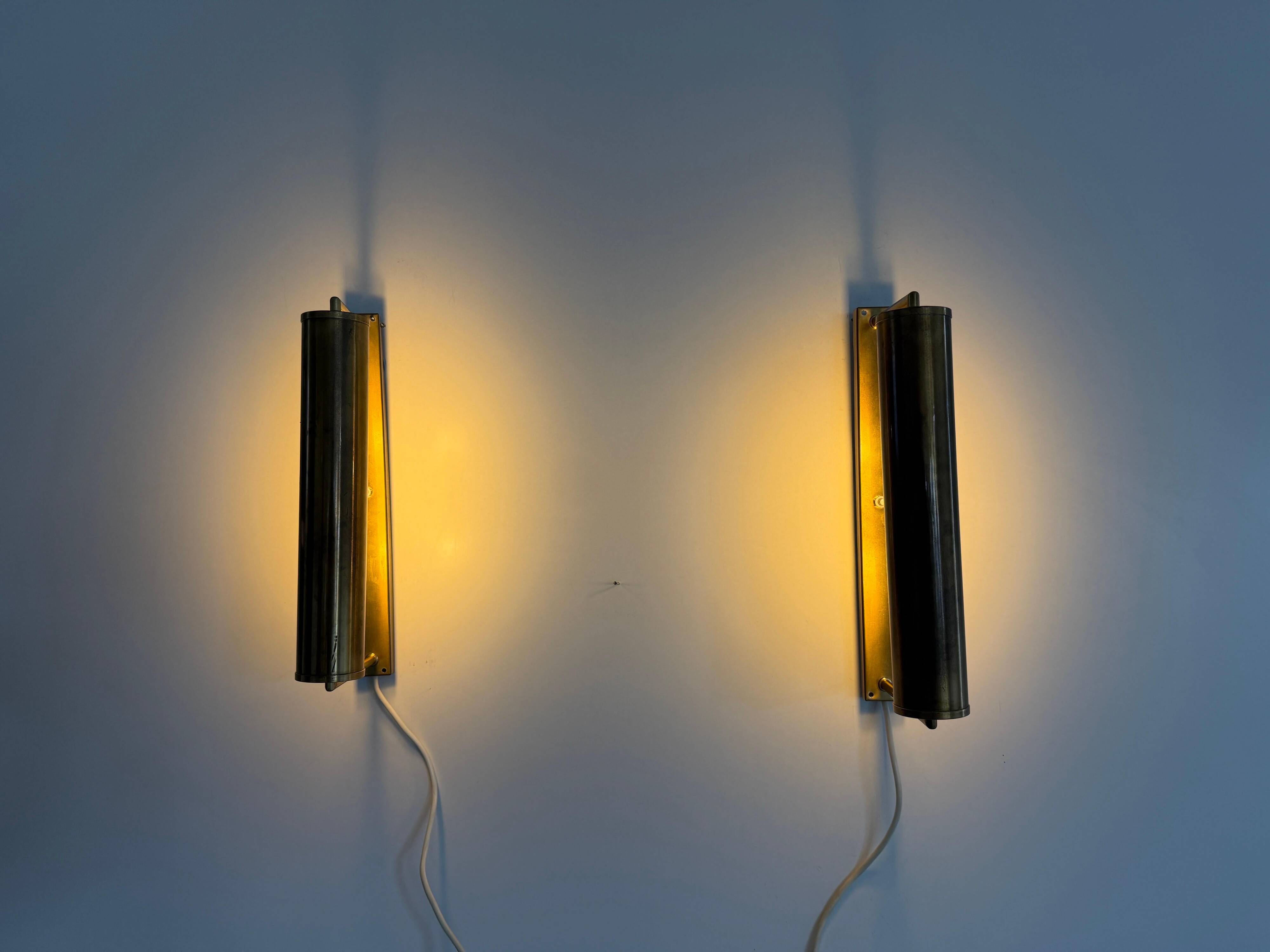 Pair of brass wall lights with adjustable heads from the mid-20th century, 1960, Germany.