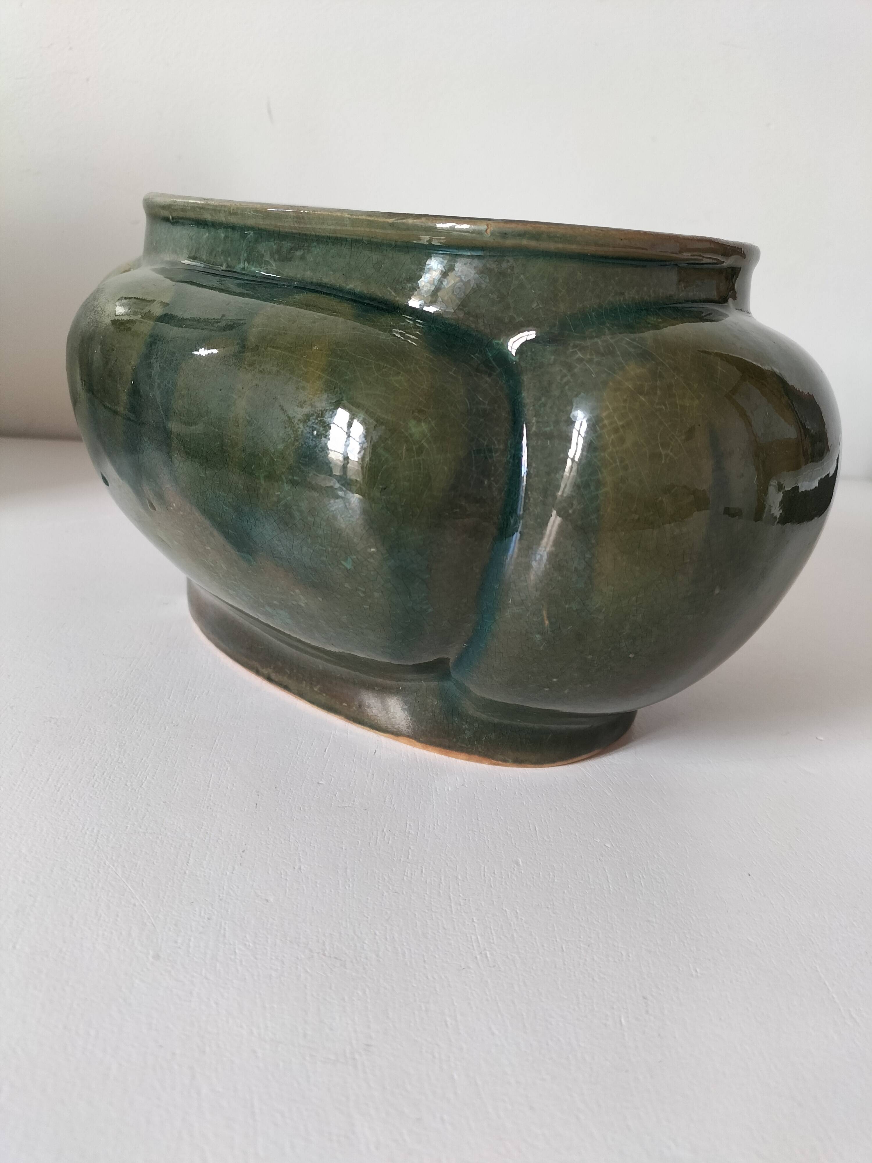 Art Deco flared cache-pot in turquoise glazed earthenware.