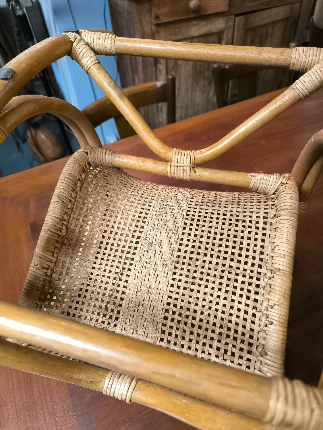 Child's rocking chair in rattan