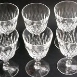 Suite of 6 Baccarat crystal water glasses with honeycomb patterns.