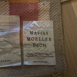 Organic jute rug with orange and pink patterns by Matias Mollenbach