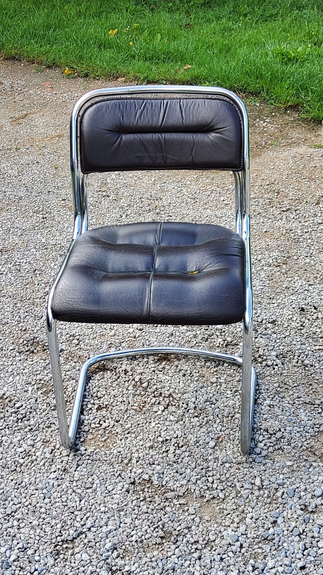 Chair from the 70s in chromed metal and brown moleskine