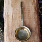 Old brass ladle