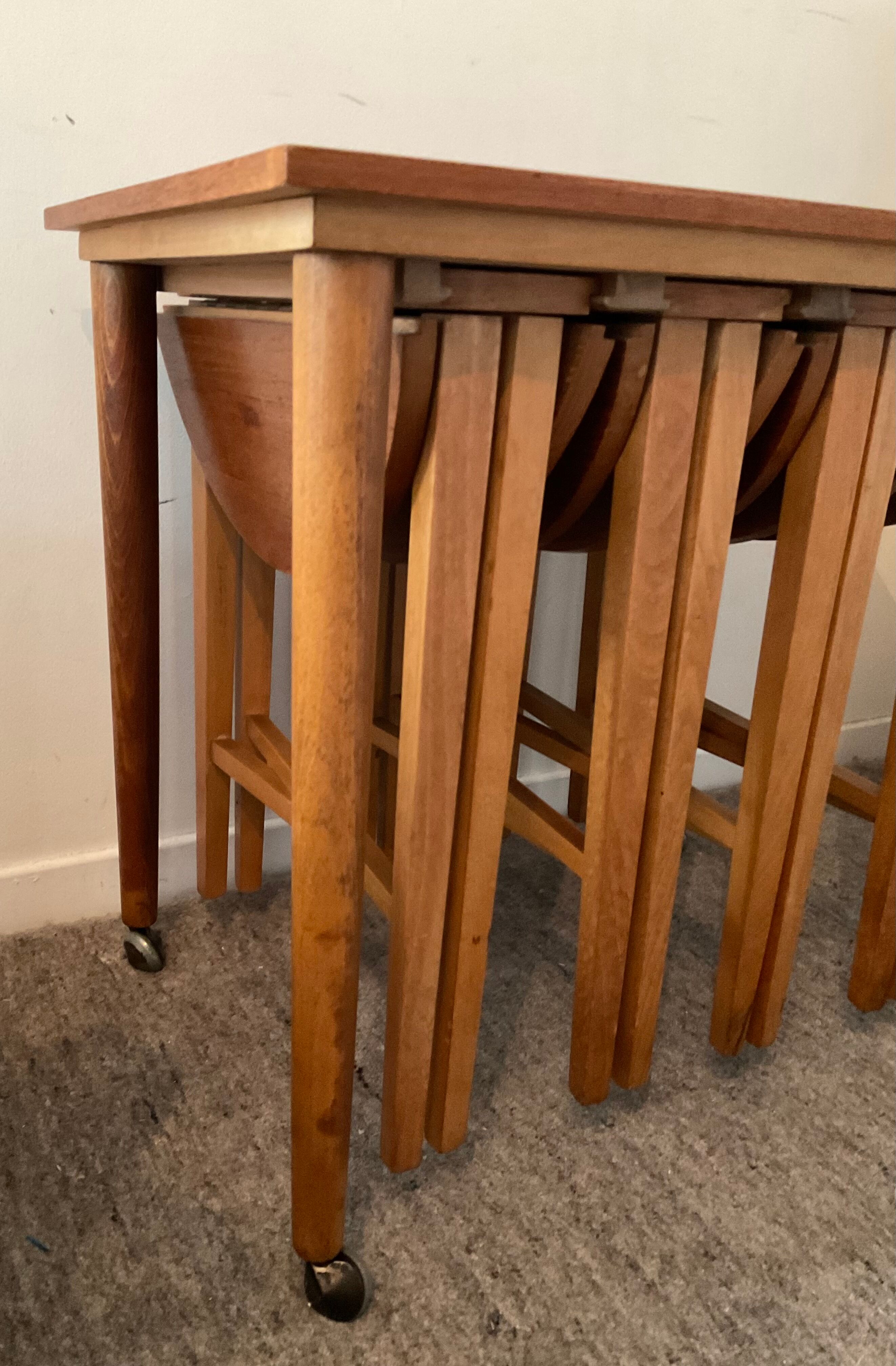 Scandinavian set by Poul Hundevad table and 4 folding teak stools