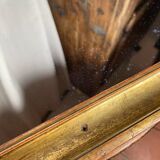 Antique mirror in gilded wood