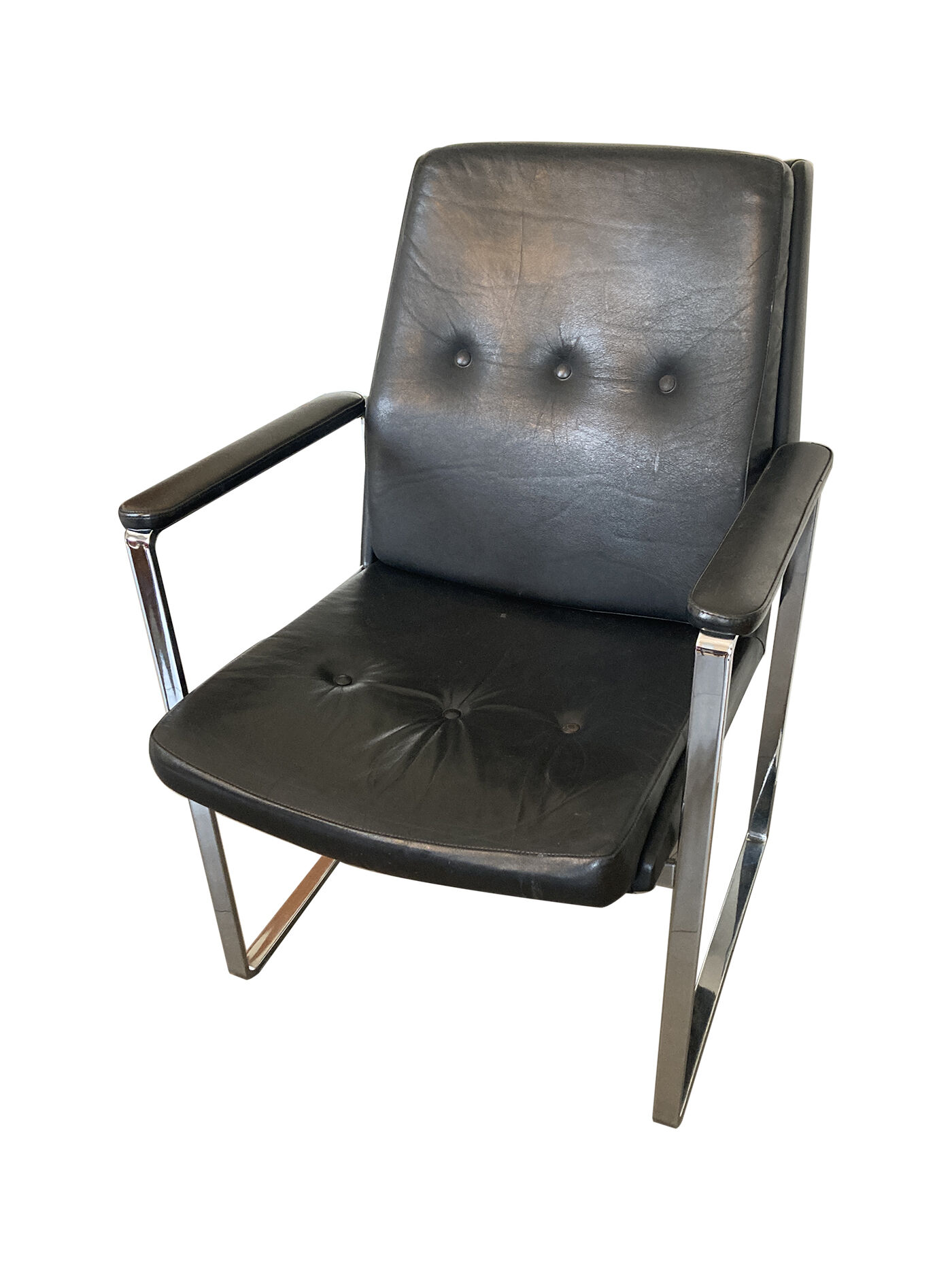 Armchair, office chair. Leather and chrome-plated steel. 1980