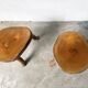 Set of three rustic solid wood tripod stools.