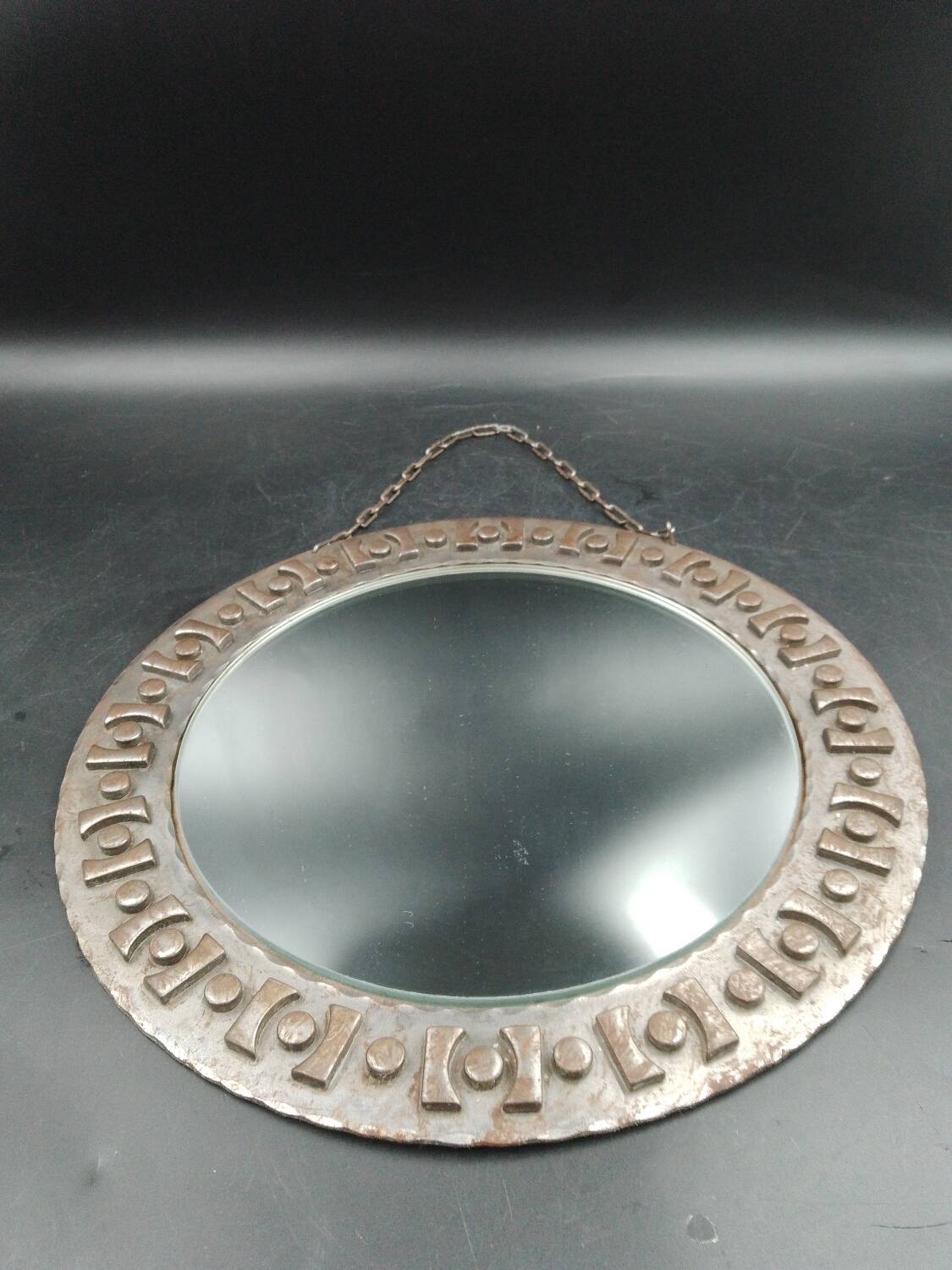 Beautiful brutalist round iron mirror in the RYCKAERT style ATELIER MAROLLES JEAN TOU