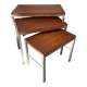 Trio of teak and chrome metal nesting tables from the 60s-70s
