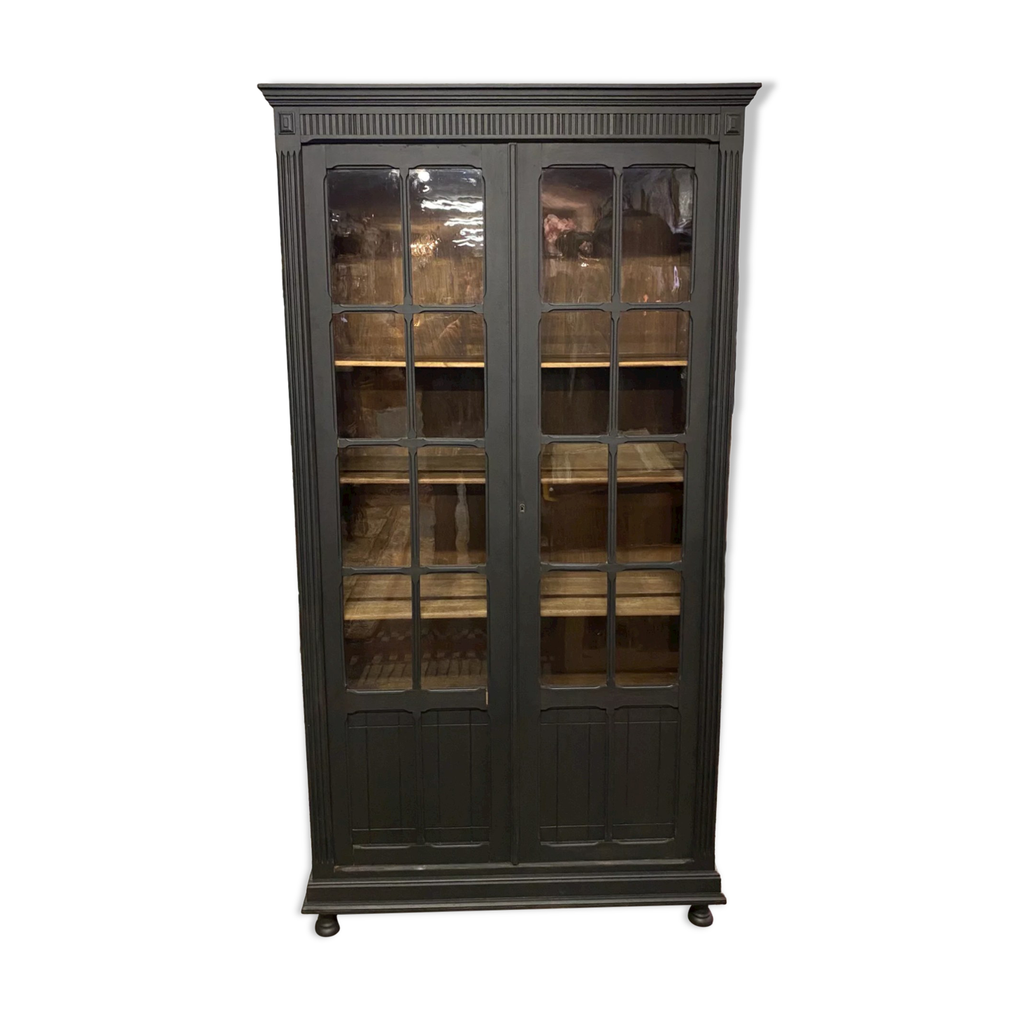 Black bookcase with glass doors