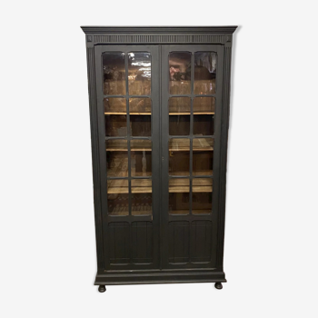 Black bookcase with glass doors