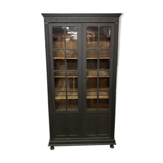 Black bookcase with glass doors