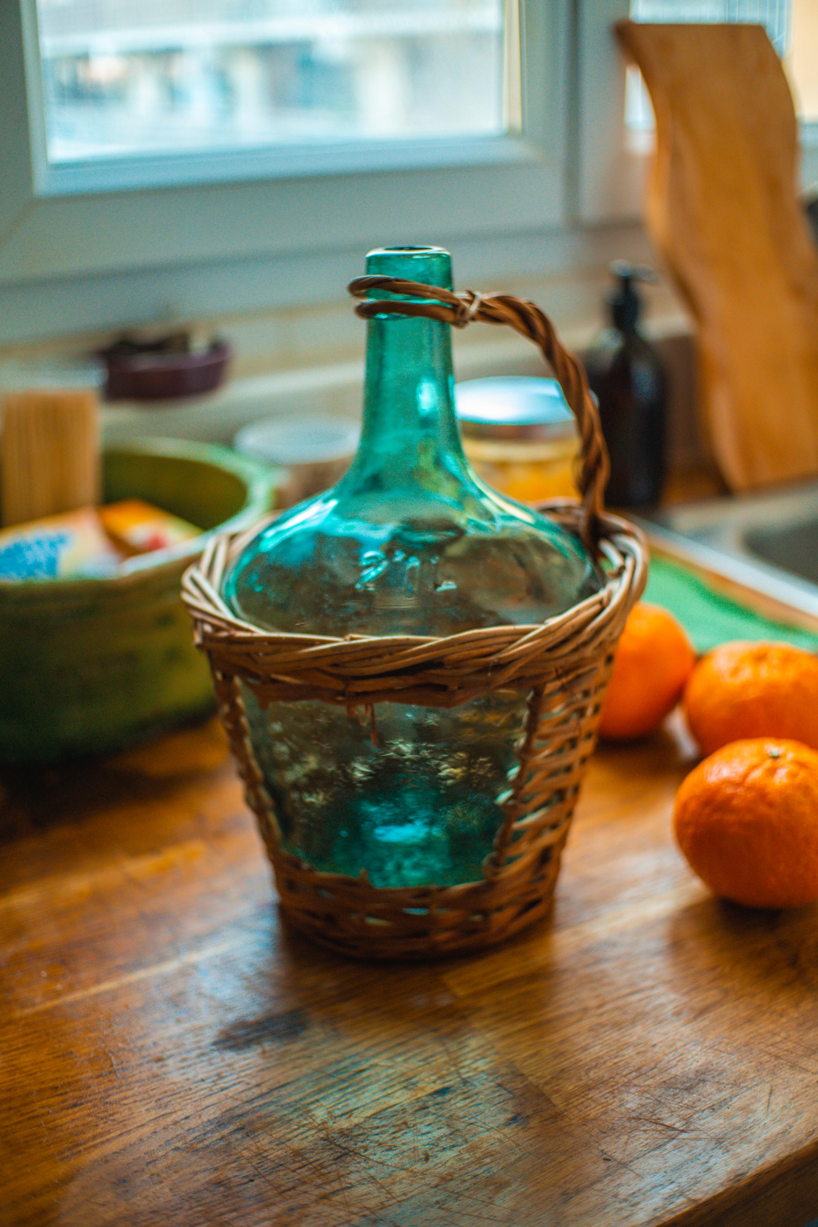 Dame Jeanne with her wicker case