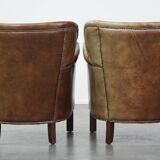 Set of 2 nice, subtle cowhide armchairs with reversible Kelim seat cushions