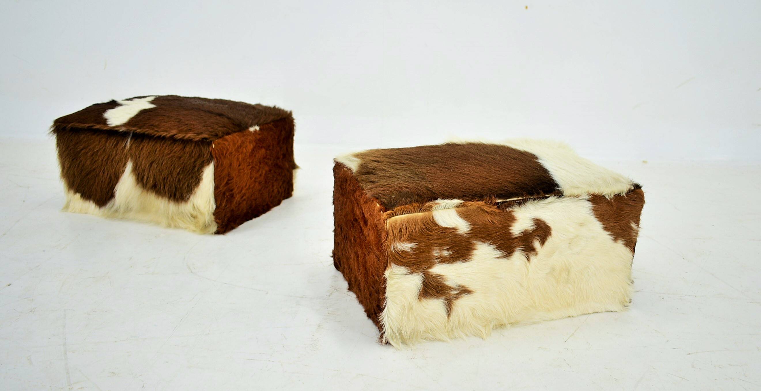 red brown leather cowhide footstools , poufs, 80s