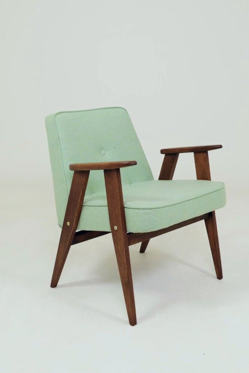 Pastel pistachio wool fabric Scandinavian armchair, oak wood.
