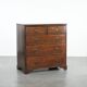 Antique English oak commode dating from the late 18th century.