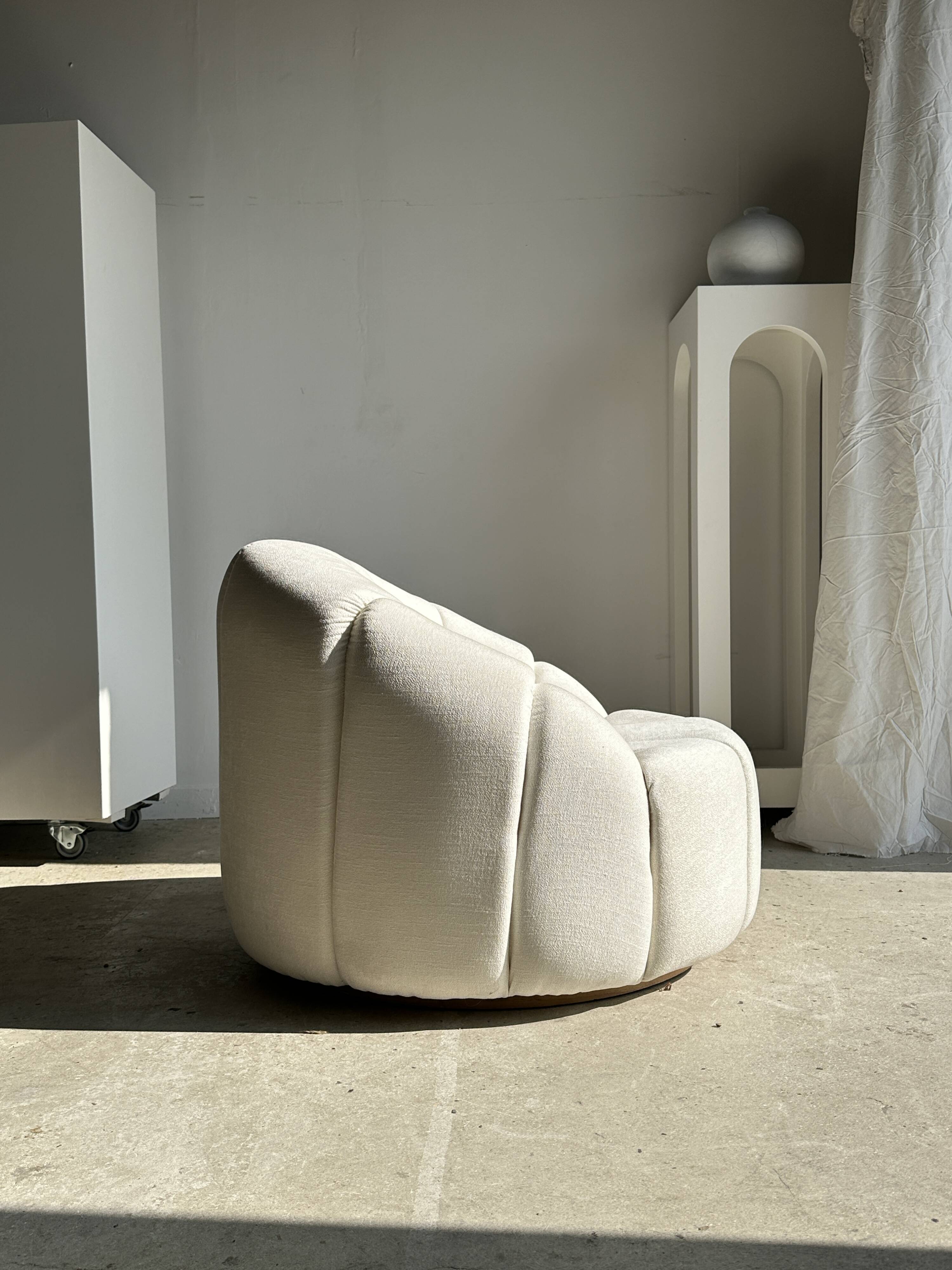 Large white circular armchair, white fabric upholstery