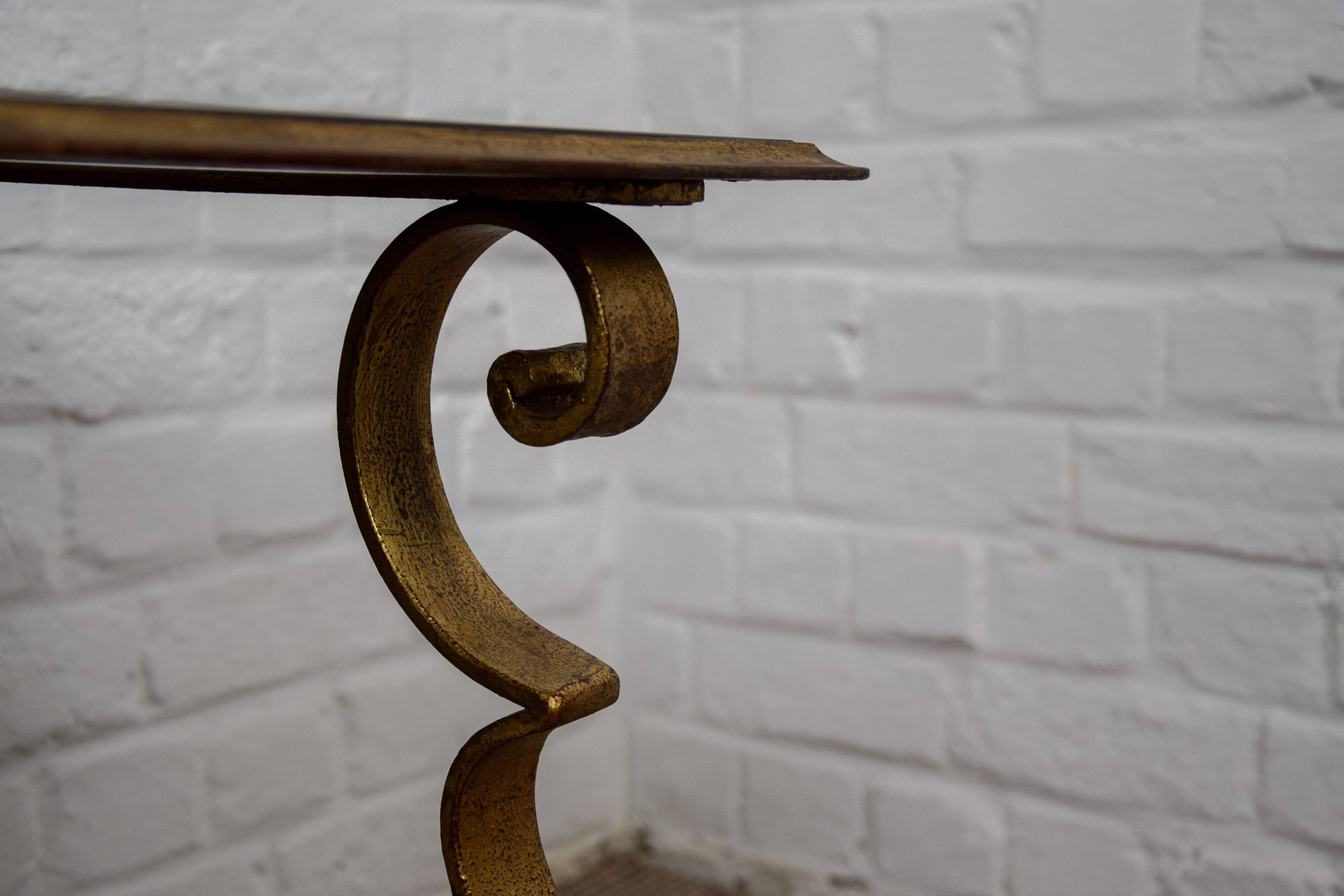 Golden wrought iron coffee table