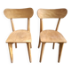 Pair of vintage solid wood bistro chairs