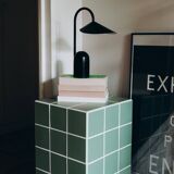 Column, side table in green ceramic tiles