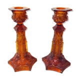 Pair of amber glass torches decorated with gothic motifs