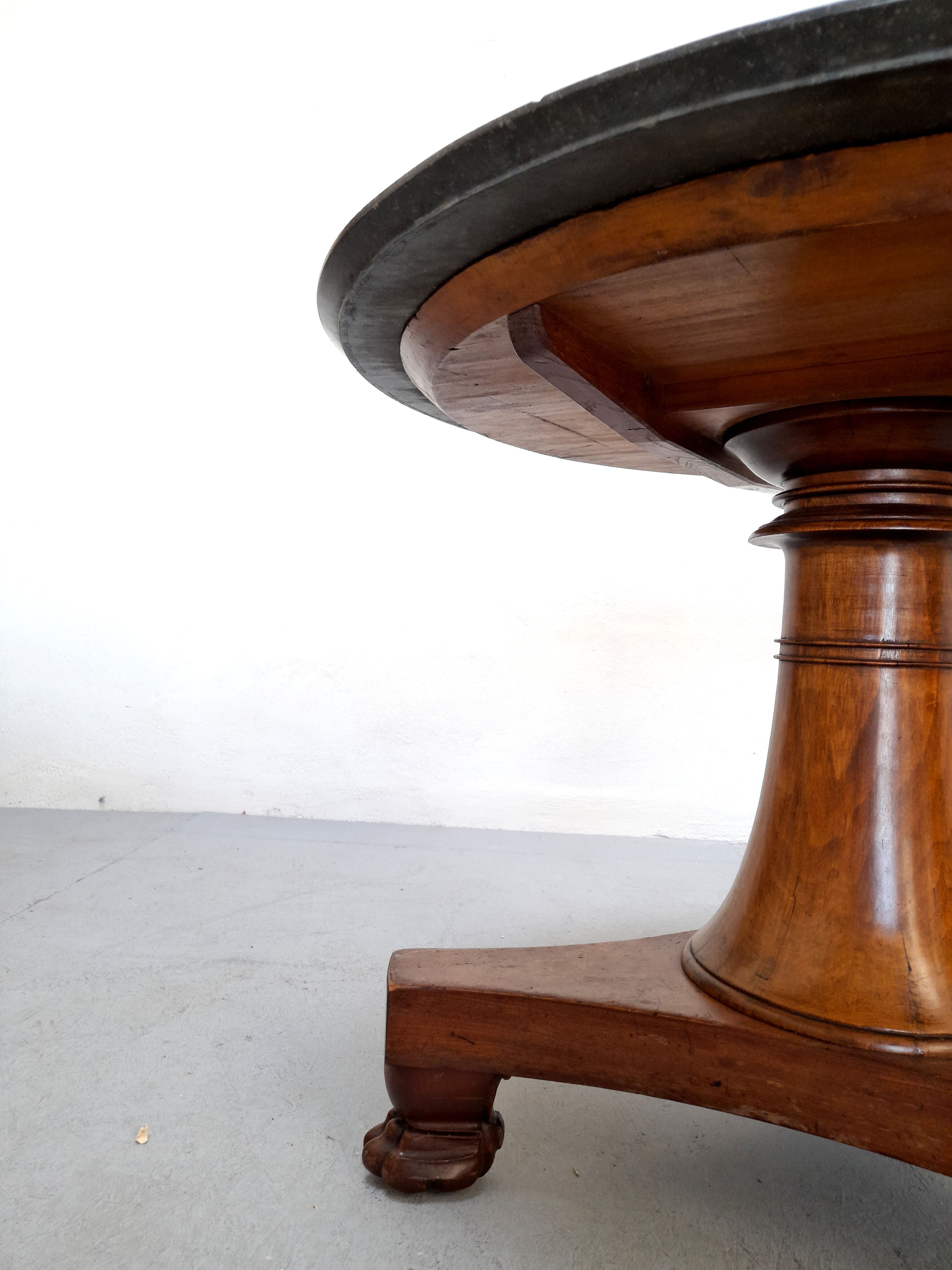 Neo-classical pedestal table in walnut and black marble - French work from the 1930s