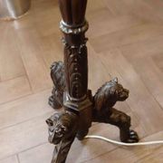 Antique floor lamp with lion motif
