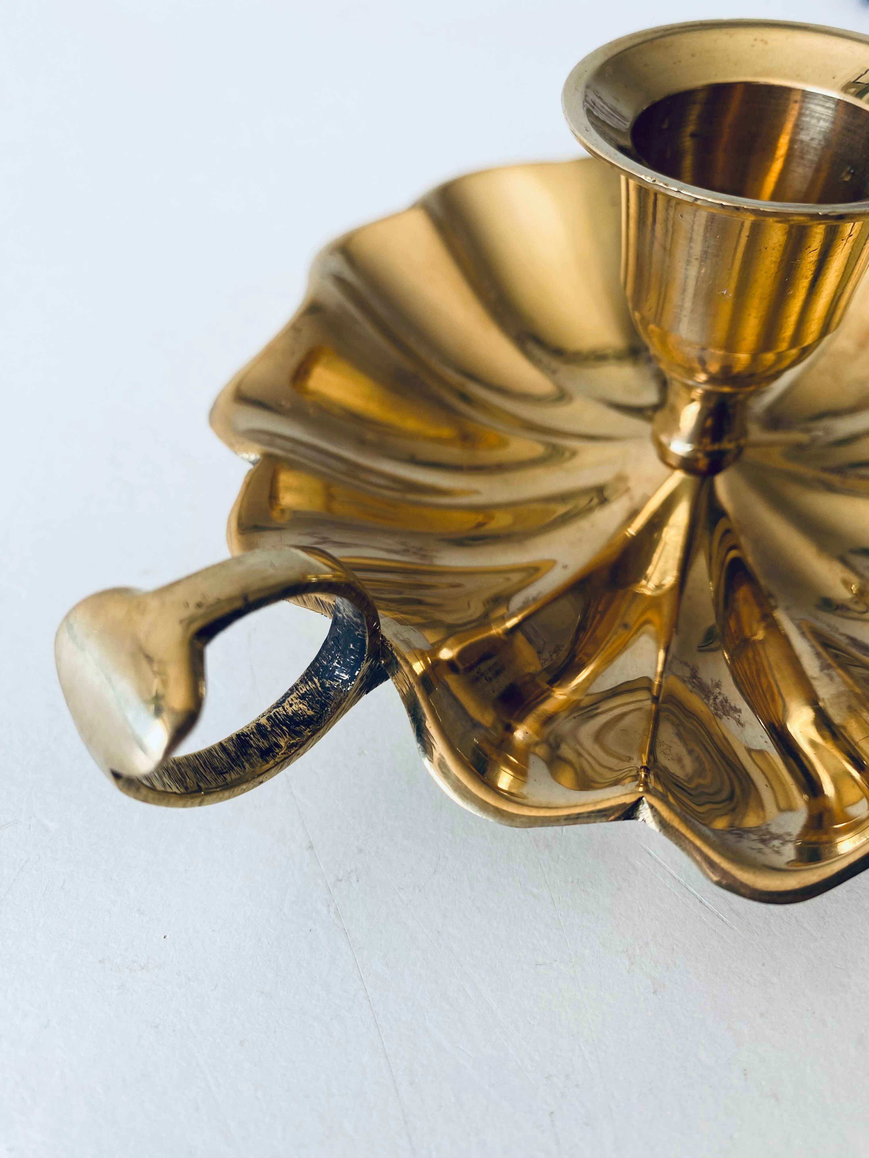 Indian candle holder in golden brass