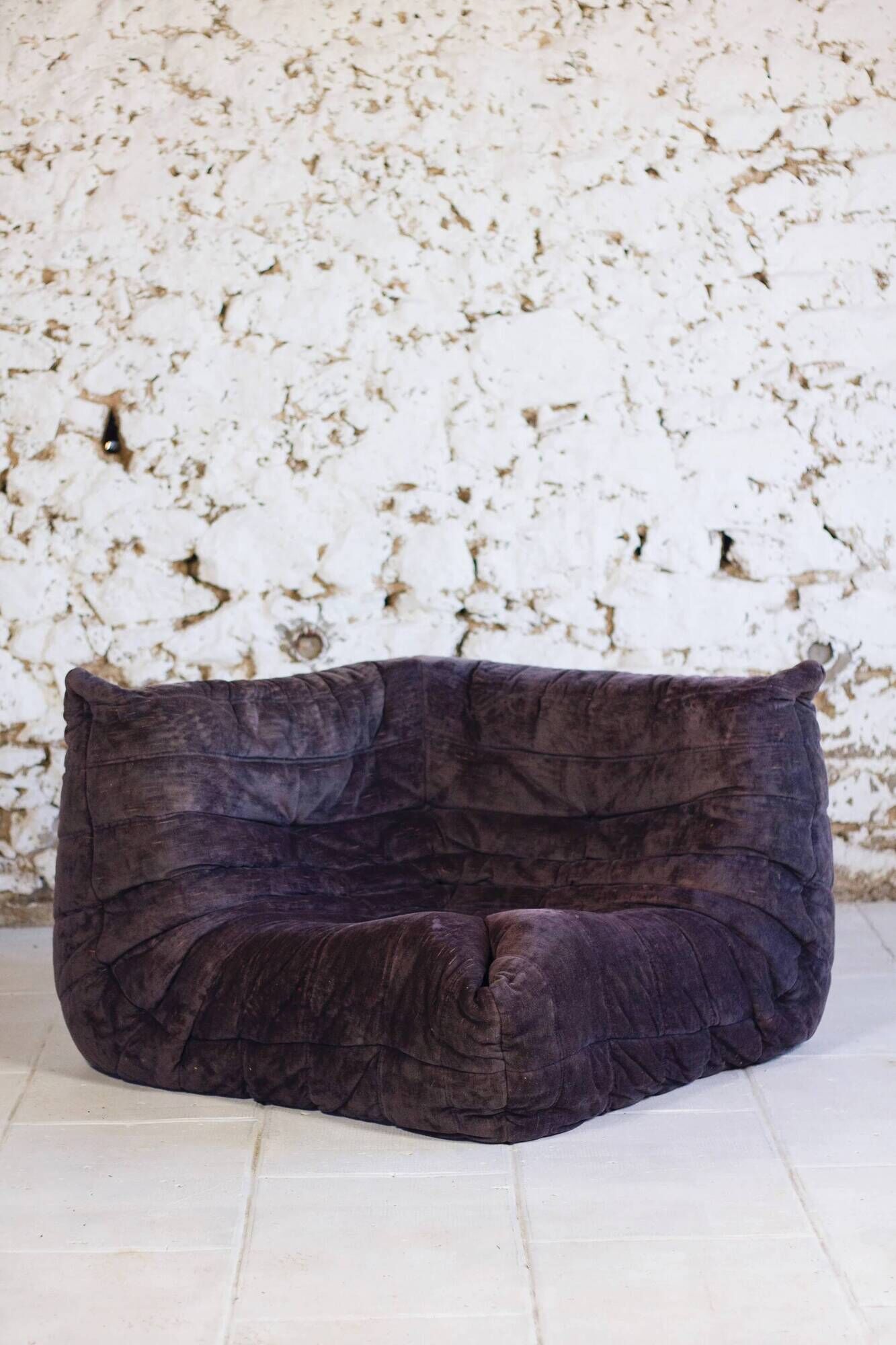 Togo aubergine corner armchair by Michel Ducaroy for Ligne Roset
