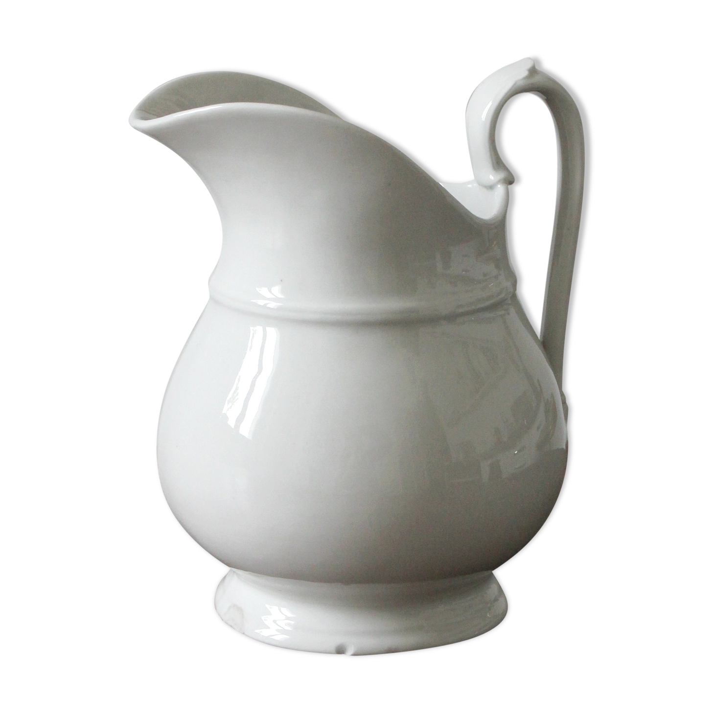 Old broc in white earthenware