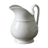 Old broc in white earthenware