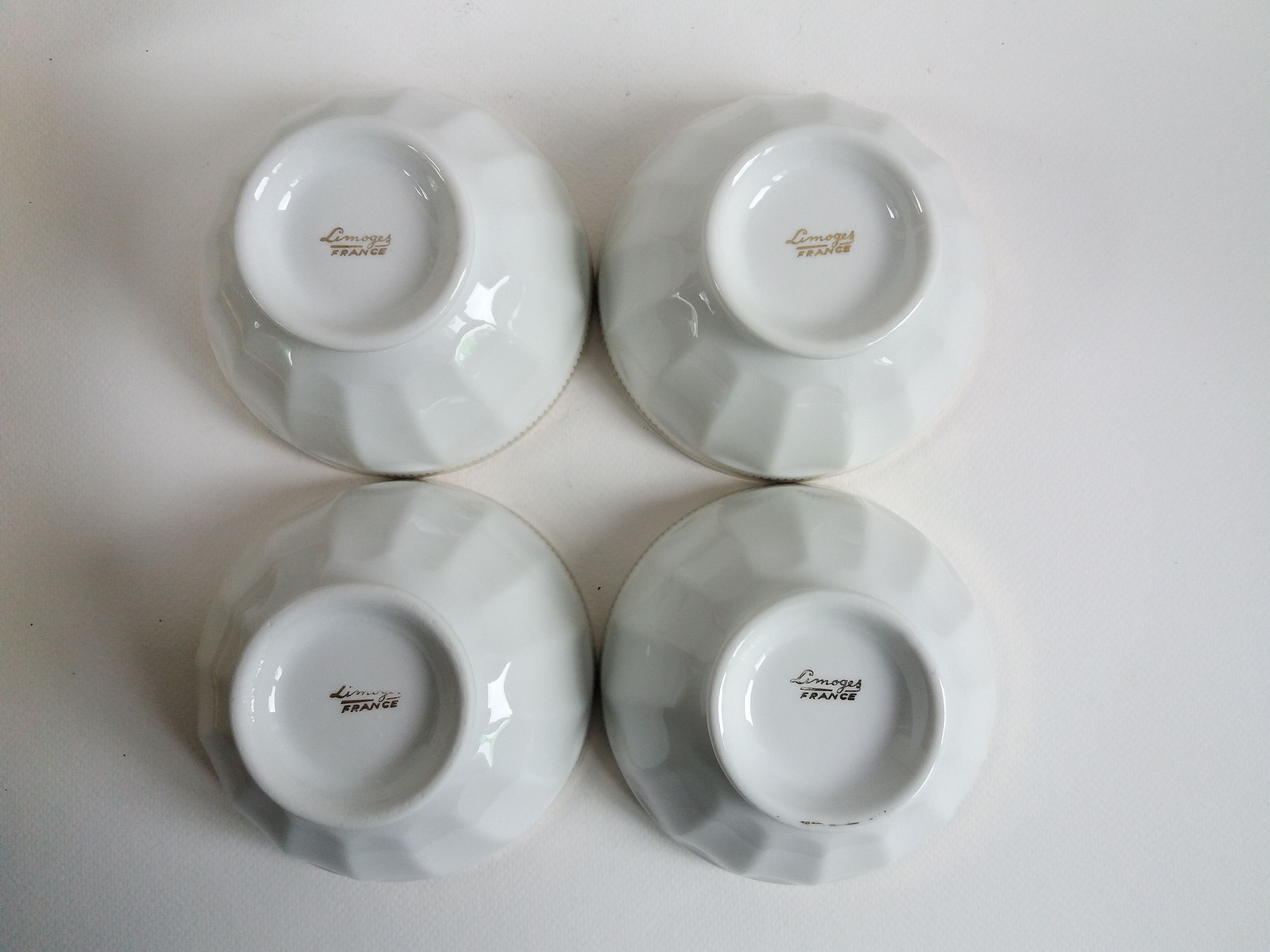 Set 4 old white and gold bowls