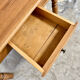 Antique coffee table in solid elm with turned legs.