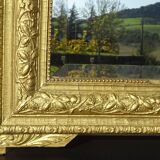 Antique wooden mirror with gilded stucco 65x83cm
